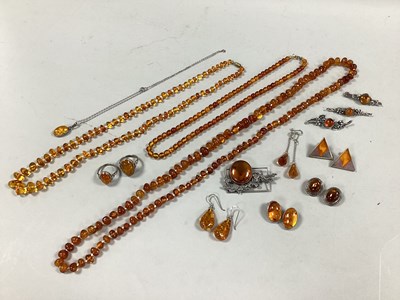 Lot 158 - A Collection of Amber Coloured and Other...