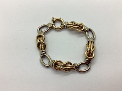 Lot 88 - A 9ct Two Colour Gold Bracelet, of fancy link...