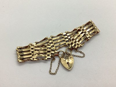 Lot 89 - A 9ct Gold Gate Link Bracelet, to heart shape...