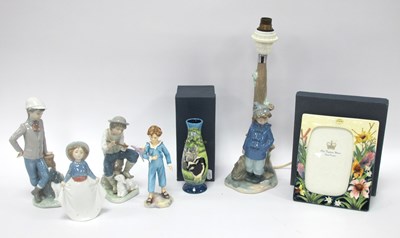 Lot 1214 - Porcelain figurines including two boxed Old...