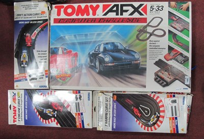 Lot 1405 - Four Vintage Aurora Slot Car Sets: AFX...