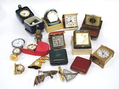 Lot 1309 - Seventeen assorted travel and figure clocks,...