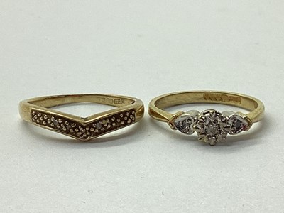 Lot 23 - A 9ct Gold Three Stone Diamond Ring, the...