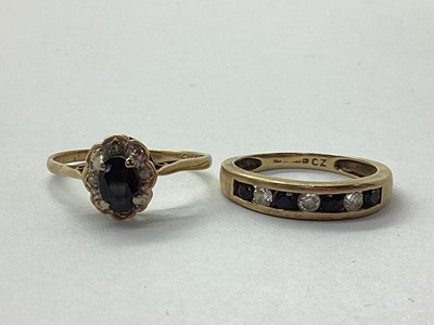 Lot 19 - A 9ct Gold Oval Sapphire Cluster Ring, claw...