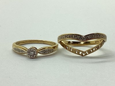 Lot 21 - A 9ct Gold Illusion Set Diamond Ring, between...