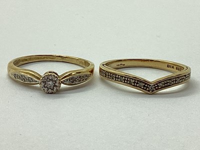 Lot 21 - A 9ct Gold Illusion Set Diamond Ring, between...