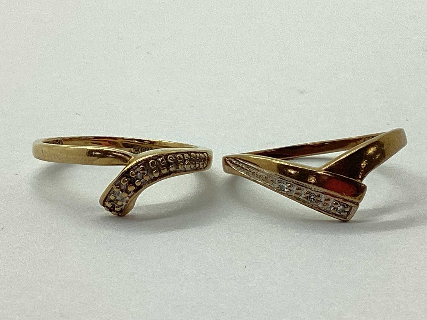 Lot 22 - A 9ct Gold Pavé Set Asymmetric Style Ring,...