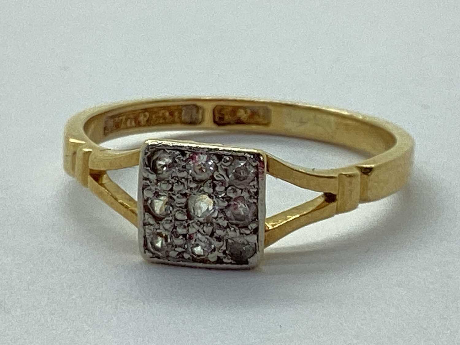 Lot 45 - An Old Cut Diamond Cluster Ring, the square...