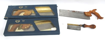 Lot 1434 - Two boxed Pax 10" brass backed hand saws,...