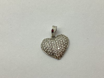 Lot 79 - A Heart Shape Pavé Set Pendant, stamped 585,...