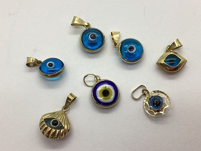Lot 69 - A Collection of Miniature 'Evil Eye' Pendants,...