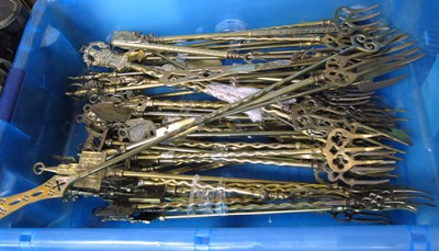 Lot 1153 - A Very Large Collection of Brass Fire Forks,...