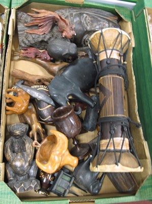 Lot 1071 - An African Wooden Hand-carved Mask, together...