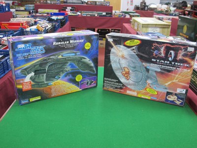 Lot 556 - Two boxed Playmates Star Trek plastic model...