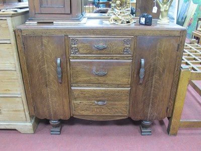 Lot 1565 - 1940's Oak Sideboard, the back with a half...