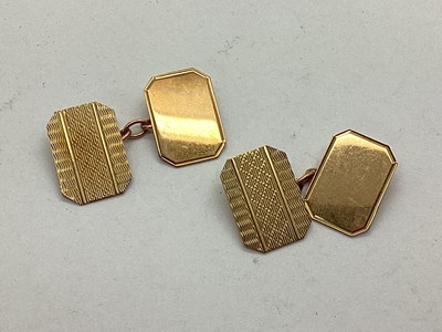 Lot 237 - A Pair of 9ct Gold Cufflinks, the part engine...
