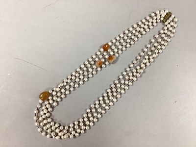 Lot 126 - A Four Strand Pearl and Hardstone Bead...
