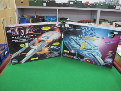Lot 544 - Two boxed Playmates Star Trek model Starships,...