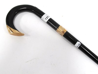 Lot 1373 - A Gentleman's Ebonised Walking Cane, with 9ct...