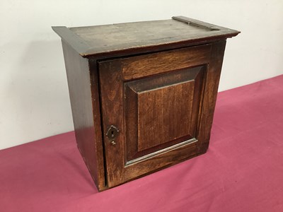 Lot 1527 - An XVIII Century Elm Spice Cupboard, with...