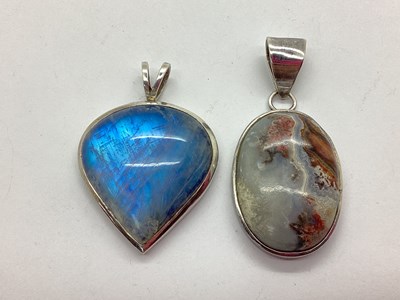 Lot 103 - A Statement Polished Hardstone Pendant, oval...