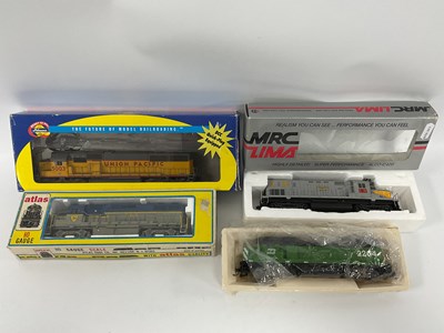 Lot 573 - Three 'HO' Gauge U.S.A. Outline Boxed Diesel...