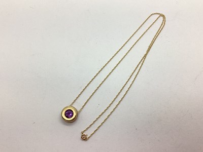 Lot 60 - A 9ct Gold Circular 'Floating' Pendant, collet...
