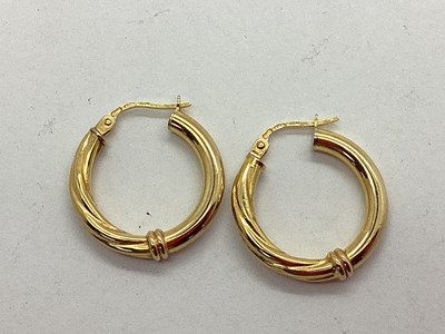 Lot 94 - A Pair of Modern Creole Earrings, part twist...