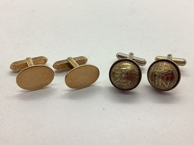 Lot 239 - A Pair of Oval Cufflinks, the plain panel to...