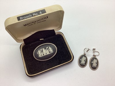 Lot 150 - Wedgwood; A Black Jasperware Oval Brooch,...