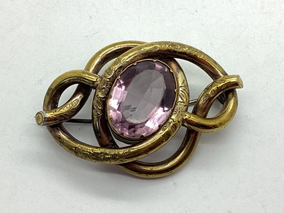 Lot 57 - A Large Antique Knot Brooch, oval collet set...