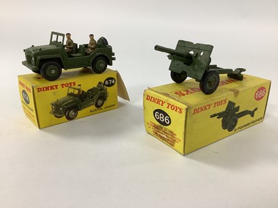 Lot 971 - Two Dinky Toys No 674 Austin Champ, overall...