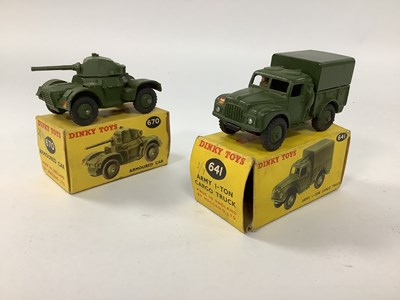 Lot 950 - Two Dinky Toys No 641 Army 1 Ton Cargo Truck,...