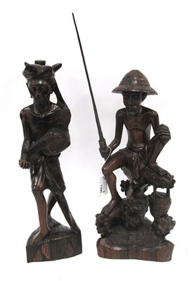 Lot 1360 - Two vintage hand-carved wooden statues...