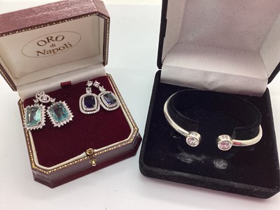 Lot 127 - A Modern Hallmarked Silver Torque Style Bangle,...