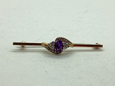 Lot 95 - A Diamond Set Bar Brooch, oval claw set to the...