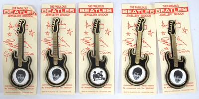 Lot 1337 - The Beatles Guitar Brooches featuring black...