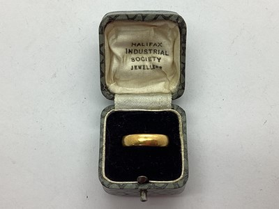 Lot 58 - A 22ct Gold Plain Wedding Band (finger size M).
