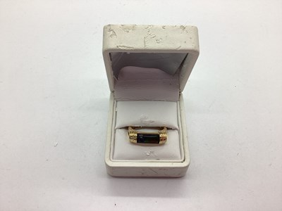 Lot 54 - Korite; An Ornate Ammolite Set Ring, the...