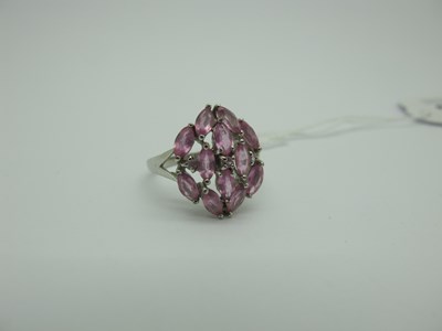 Lot 303 - A Modern 9ct White Gold Pink Sapphire Cluster...
