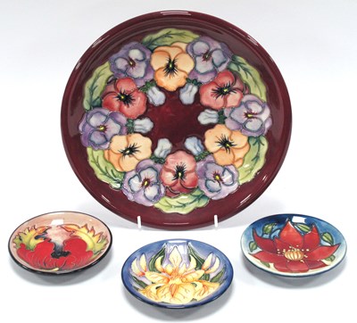 Lot 1068 - A Moorcroft Pottery Plate, of circular form,...