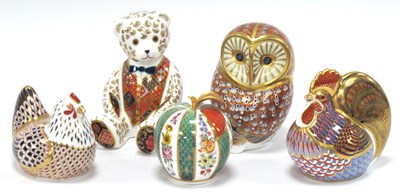 Lot 1079 - Four Royal Crown Derby Porcelain Paperweights,...