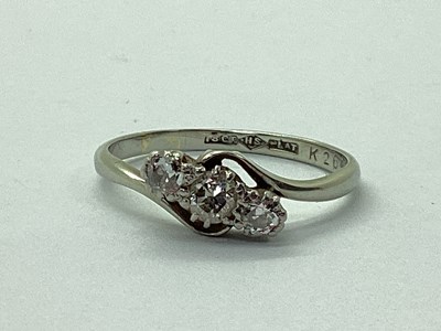 Lot 72 - A Three Stone Diamond Ring, the graduated old...