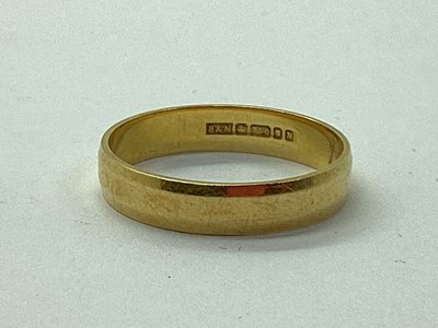 Lot 74 - An 18ct Gold Wedding Band, inside inscribed...