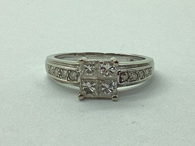 Lot 177 - A Modern 18ct White Gold Princess Cut Diamond...