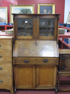 Lot 1510 - An Early XX Century Art Nouveau Style Oak...