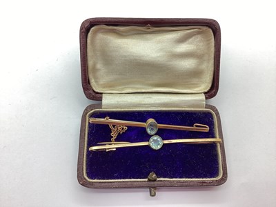 Lot 93 - An Oval Collet Set Bar Brooch, attached safety...