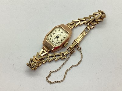 Lot 308 - Record; A 9ct Gold Cased Ladies Wristwatch,...