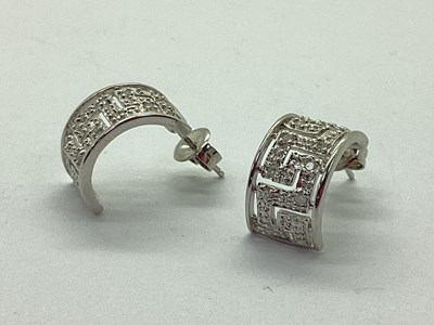 Lot 86 - A Pair of Modern Diamond Set Half Hoop...