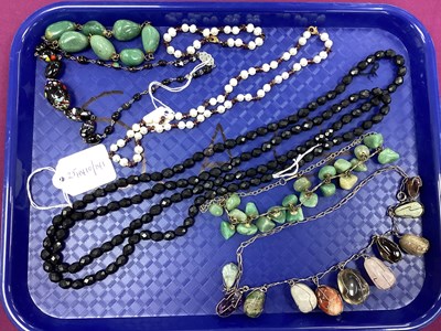 Lot 266 - Antique and Later Bead Necklaces, tumbled...